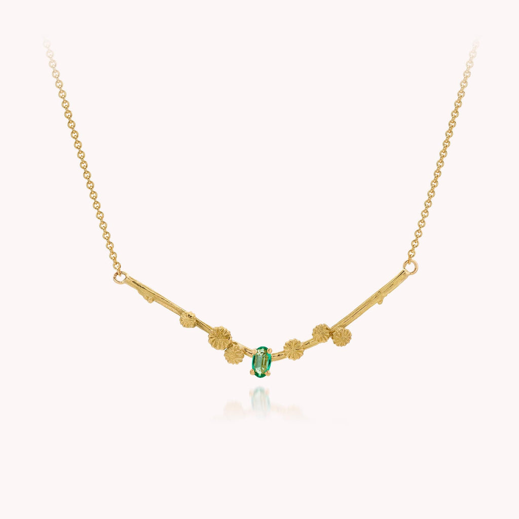 geelgouden halsketting met smaragd