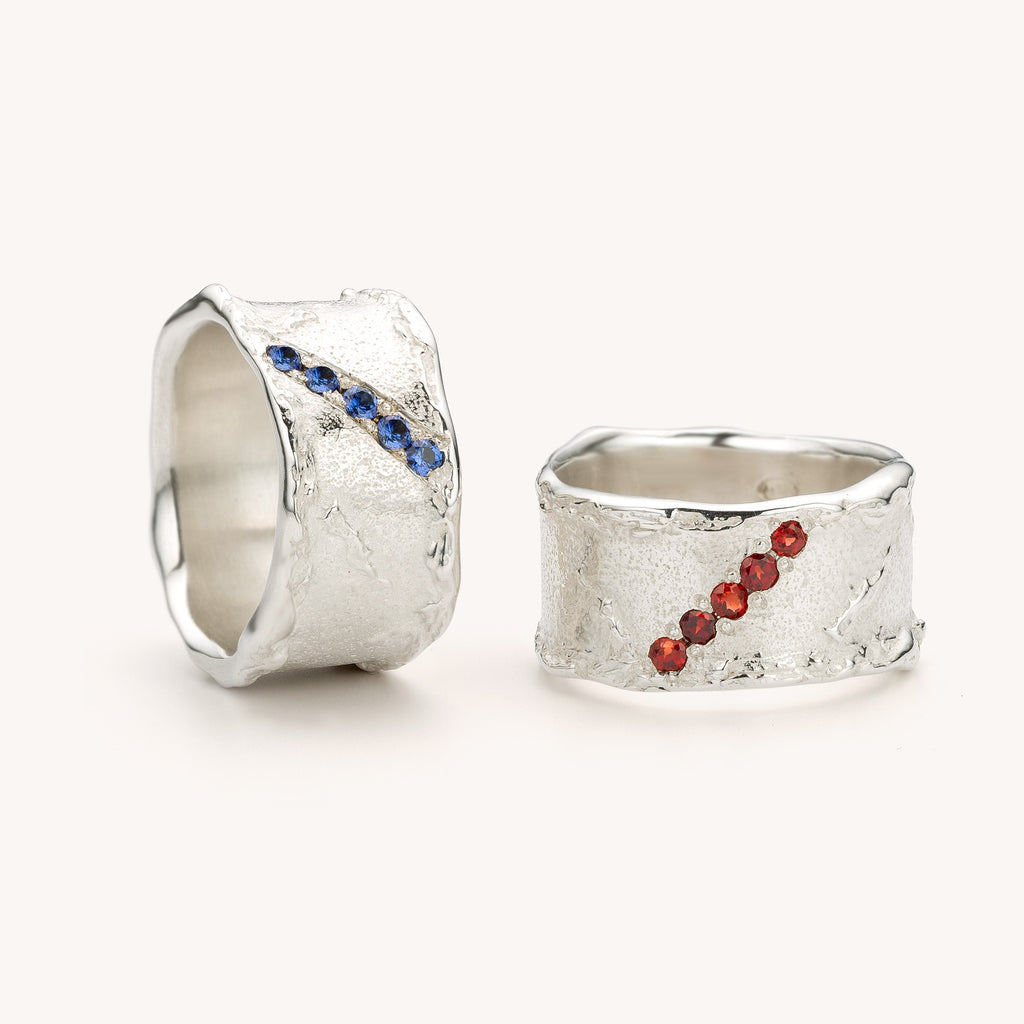 zilveren ring met granaat of saffier