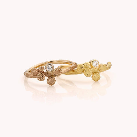 gouden ring met bloemknoopjes en diamant